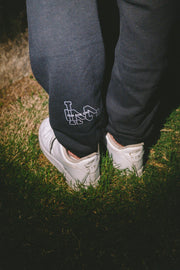 WNDR RELAXED TRACK PANTS - JET BLACK